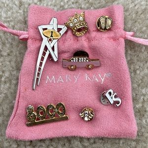 Various Mary Kay accolade pins